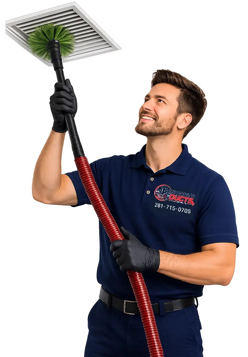 Cleaning Ducts Houston technician