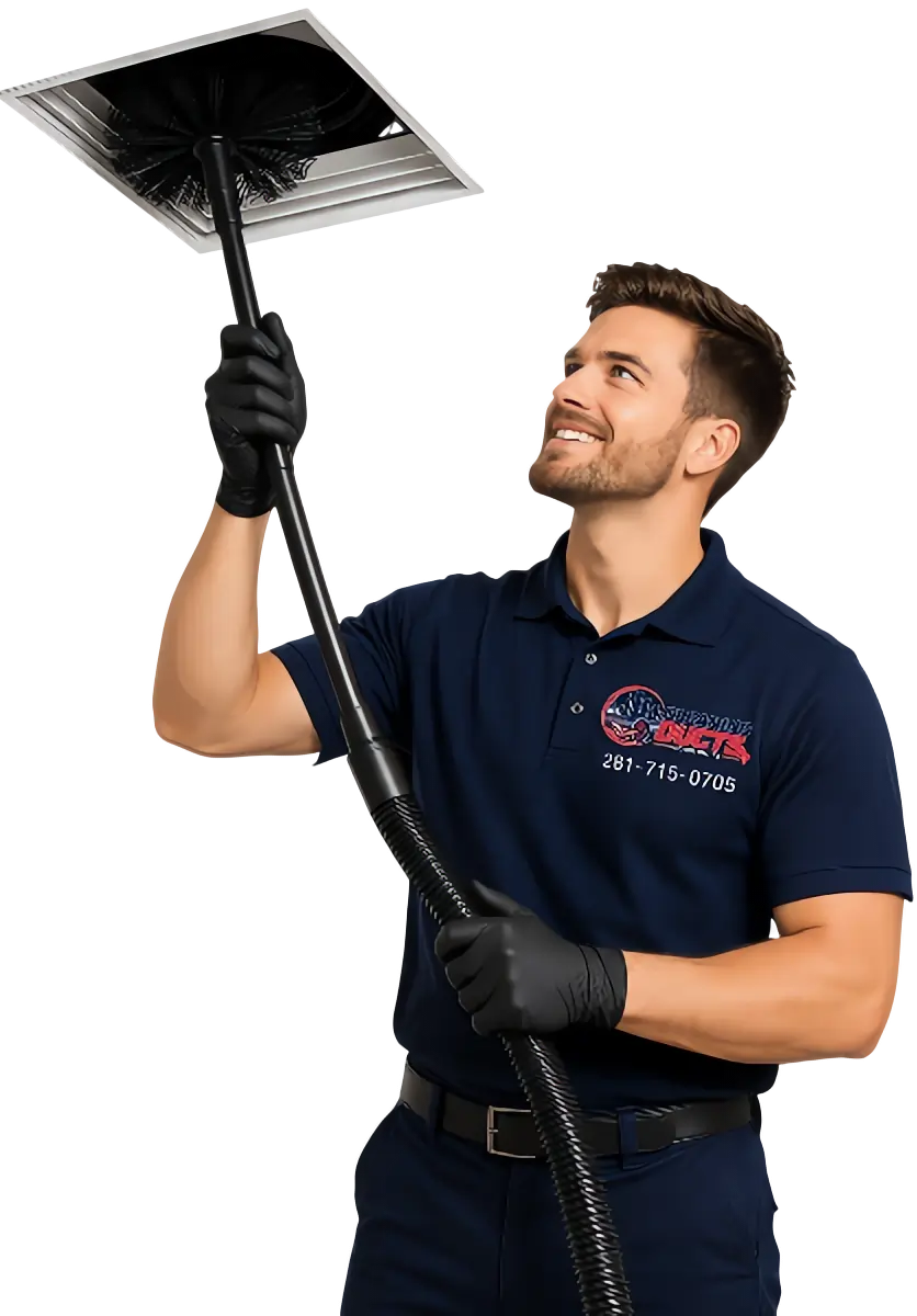 Cleaning Ducts Houston technician